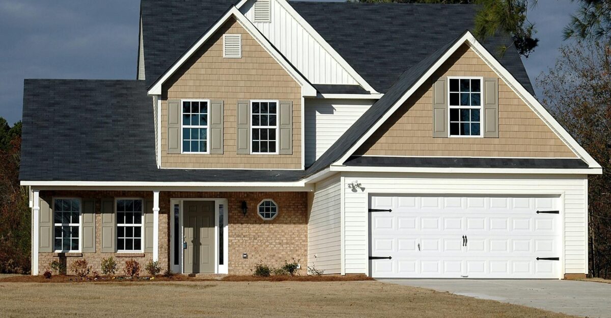 Elegant two-storey house with garage showcasing modern architecture and residential charm