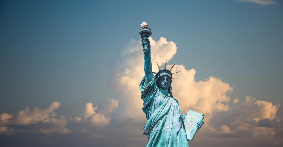 Iconic Statue of Liberty with majestic clouds in New York USA Perfect travel destination image
