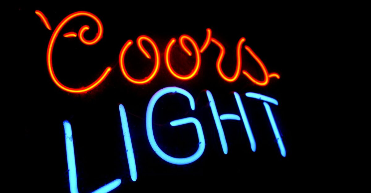 Glowing Coors Light neon sign illuminating the night in Miami Beach Florida