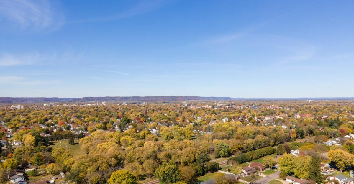 A vibrant aerial image showcasing residential areas and fall foliage in La Crosse Wisconsin