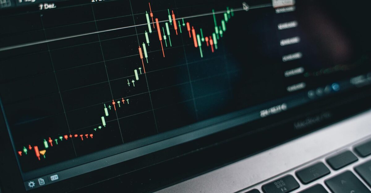Close-up of a computer screen displaying cryptocurrency market trends and data