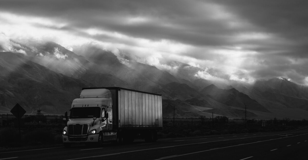 white trailer truck on road