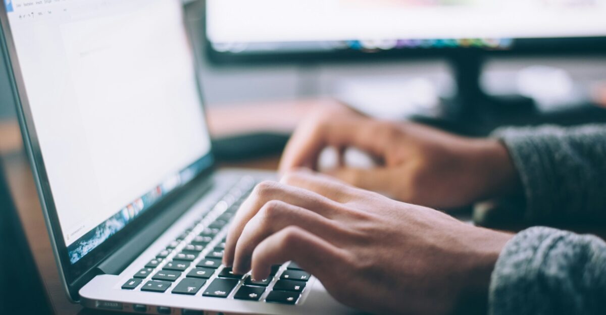 person using MacBook Pro