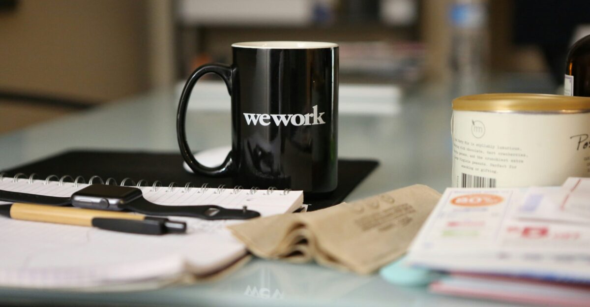 black ceramic mug on book