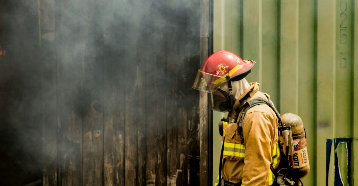 shallow focus photo of firefighter
