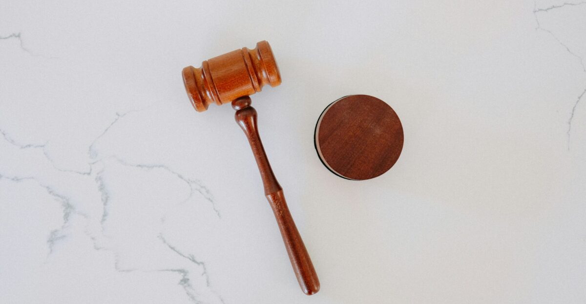 brown wooden smoking pipe on white surface