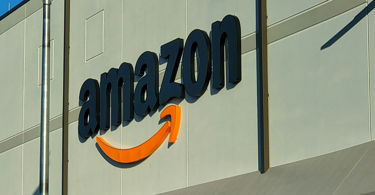 an amazon store with a person sitting in front of it
