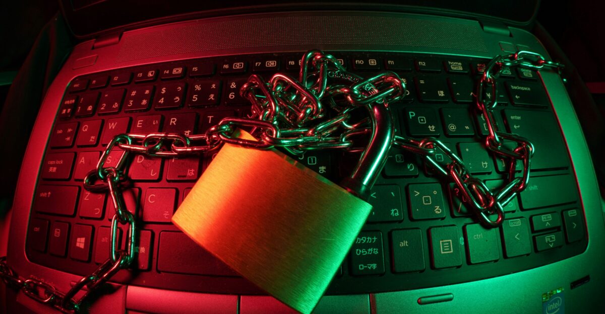 brown padlock on black computer keyboard