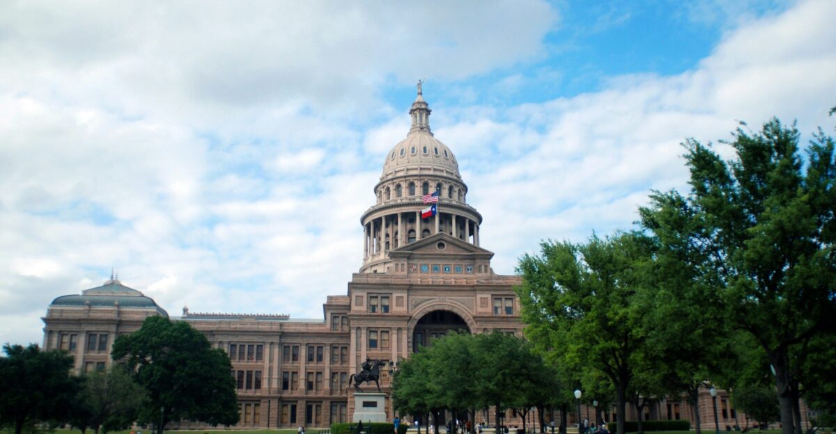 brown concrete building under blue sky during daytime