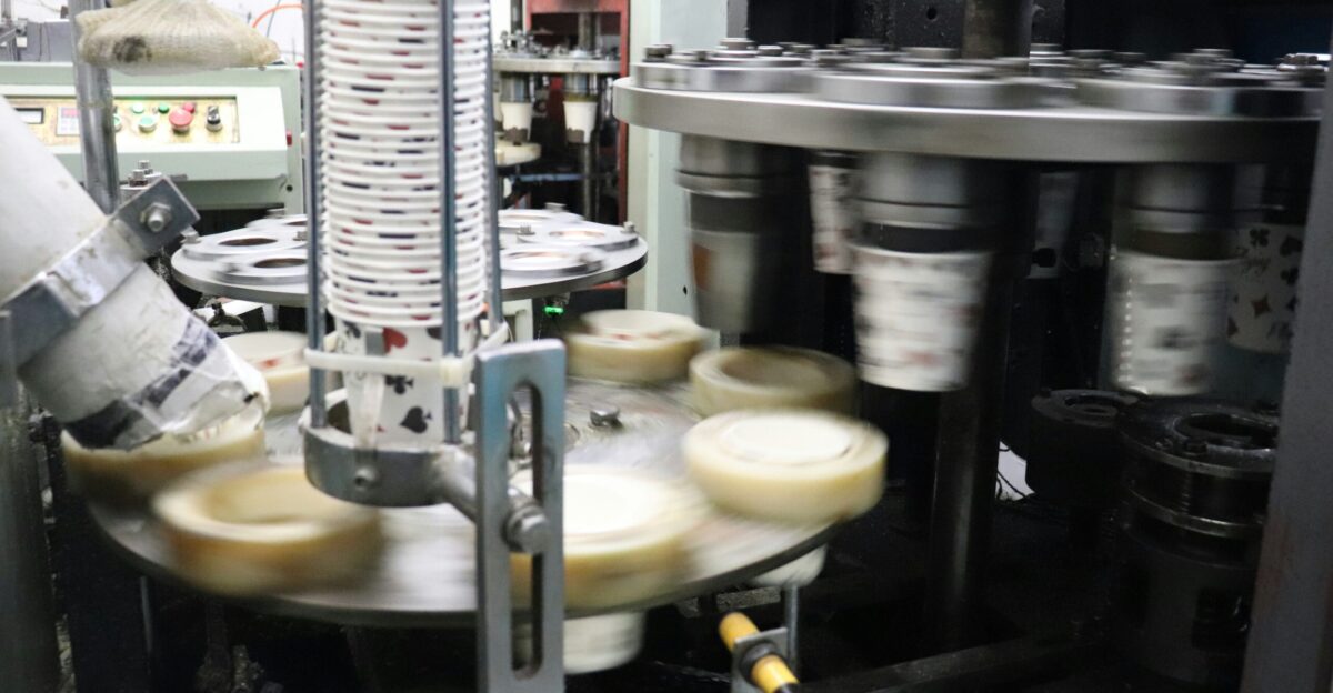 a machine making cheese in a factory