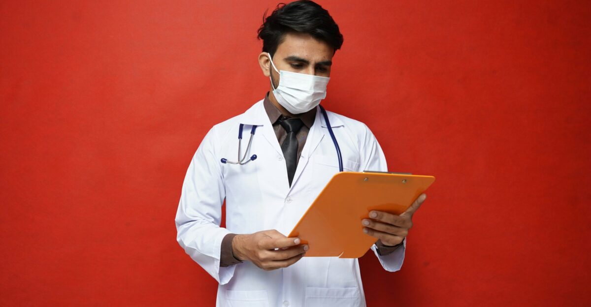 a doctor holding a tablet