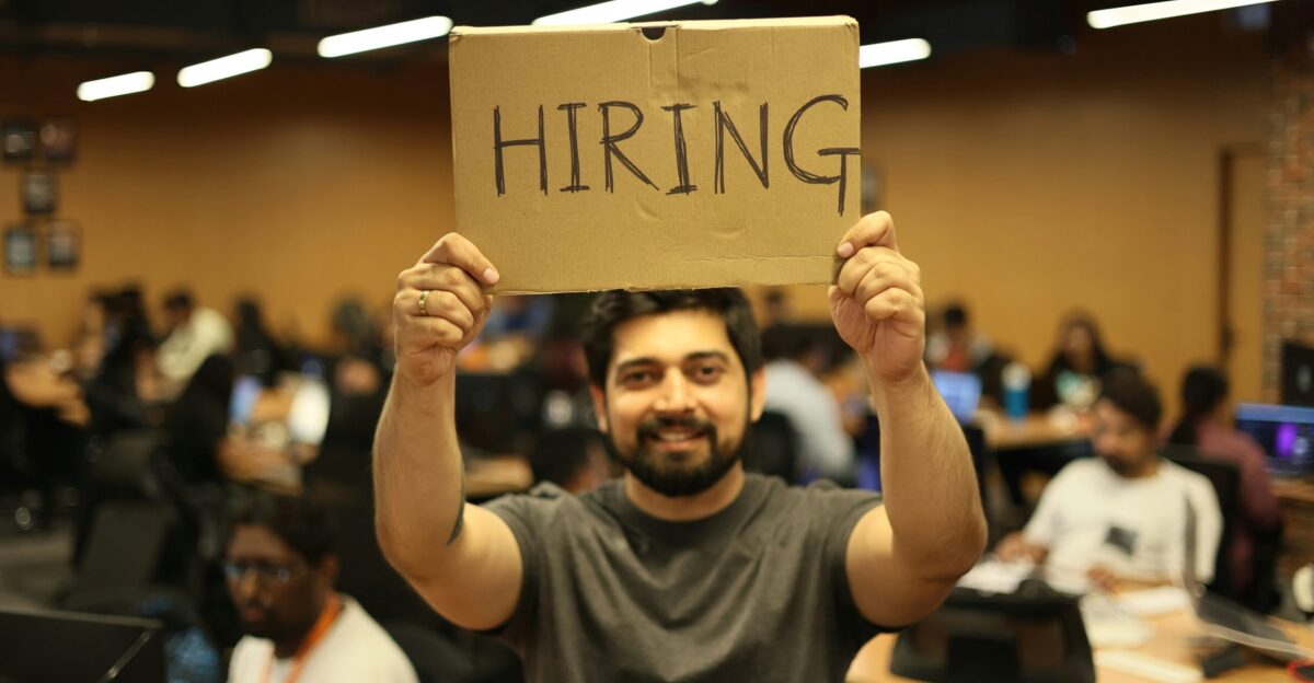 a man holding a sign