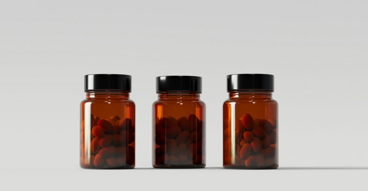 a group of jars with different colored contents