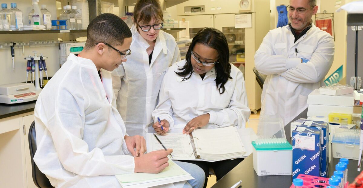a group of people working in a lab