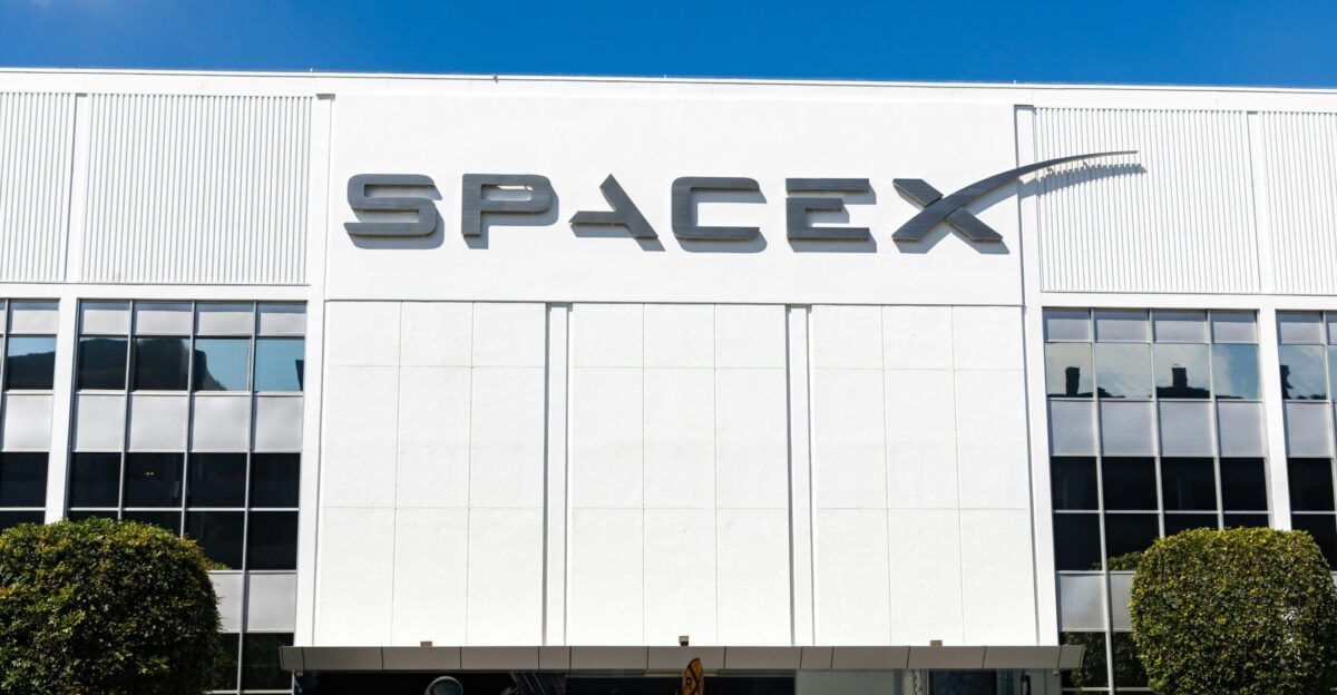 a building with a sign that says spacex on it
