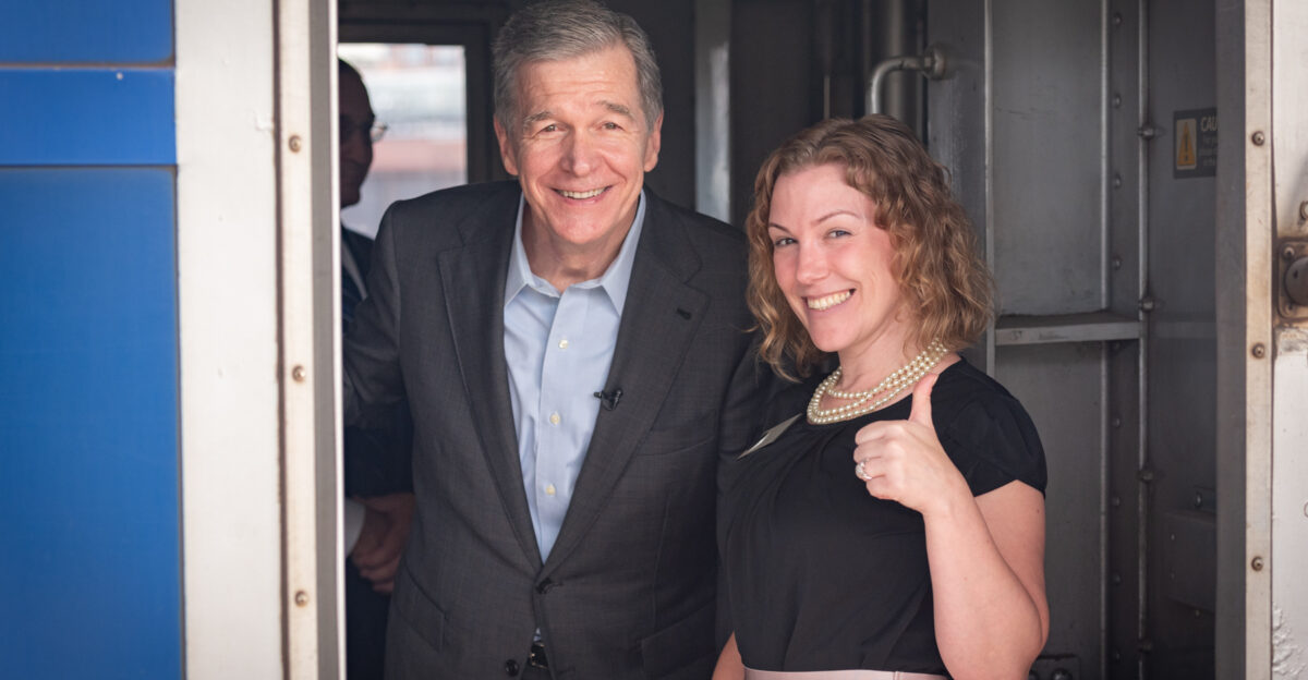 Governor Roy Cooper on board a train between Raleigh and Charlotte in November 2023