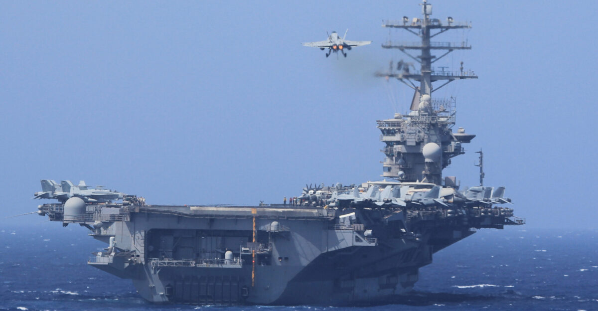 U S 5TH FLEET AREA OF RESPONSIBILITY Oct 5 2013 An F A-18E Super Hornet prepares to land on the flight deck aboard the aircraft carrier USS Nimitz CVN 68 after participating in an air power demonstration The Nimitz is deployed to the U S 5th Fleet area of responsibility conducting maritime security operations and theater security cooperation efforts U S Navy photo by Mass Communication Specialist 3rd Class Preston Paglinawan Released