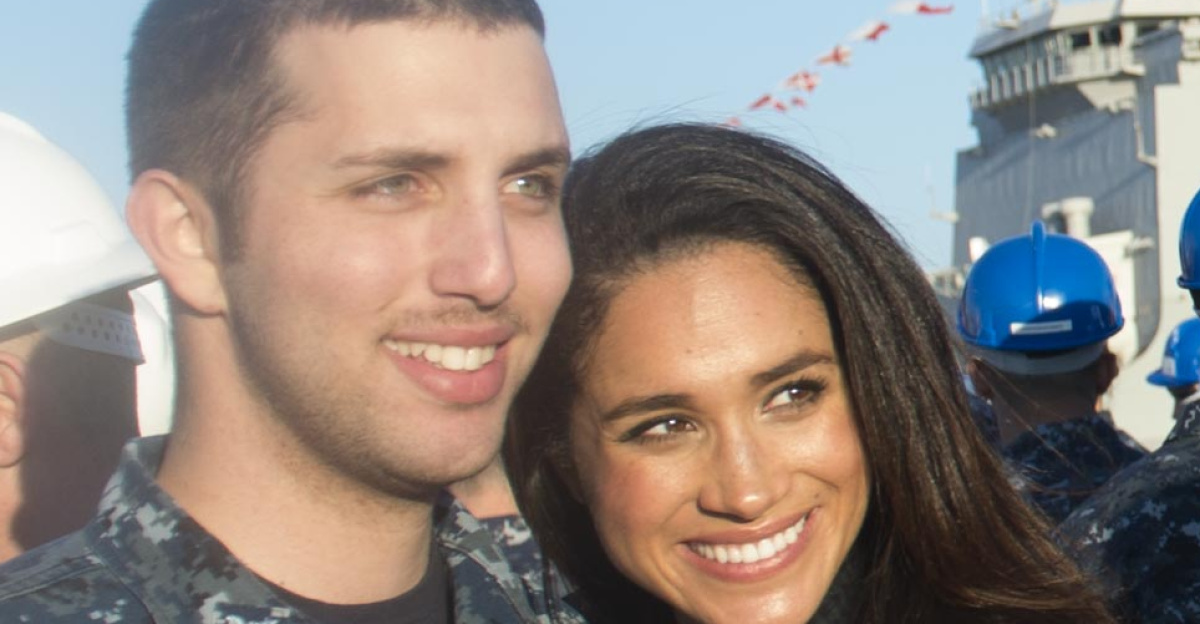 Actress Meghan Markle, takes a photo with a Sailor while visiting the crew of the USS Ross in Rota, Spain, Dec. 6, 2014.  Markle is volunteering with the USO to visit US service members who are deployed outside of the US during the holidays.  (DOD photo by D. Myles Cullen/Released)