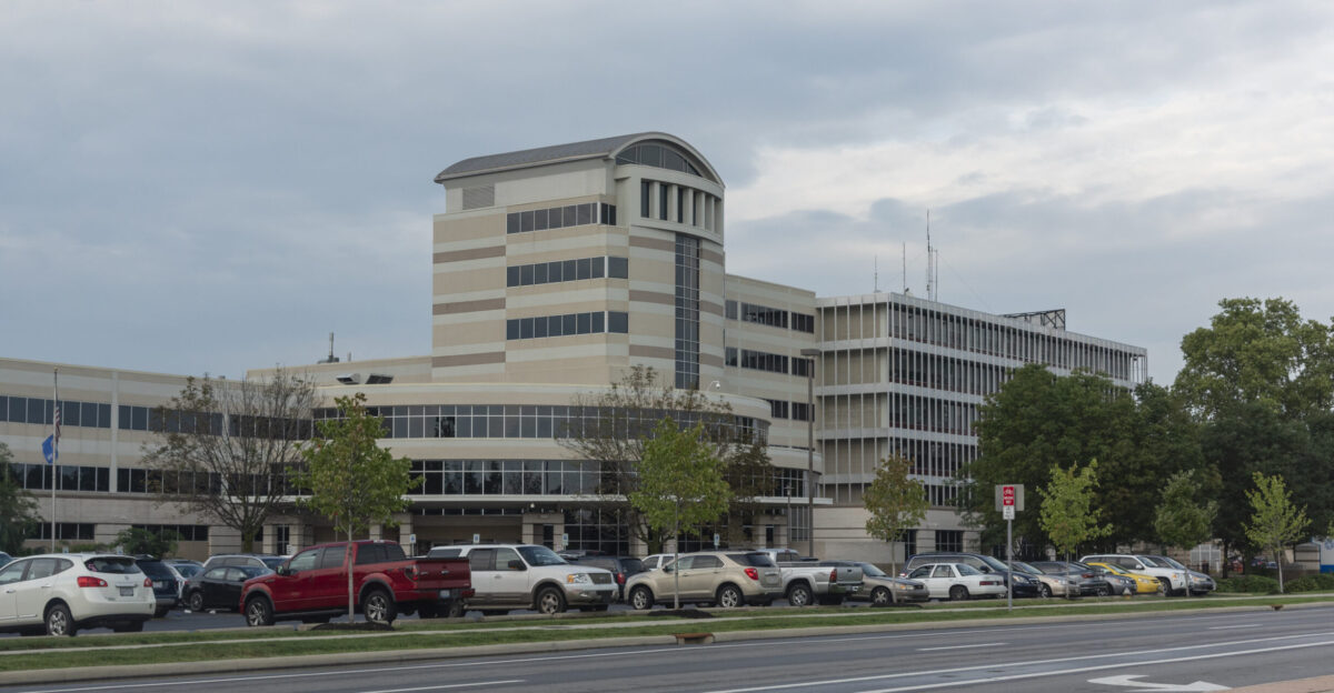 A southwest view of the front of Doctors Hospital located on Broad Street U S Route 40 A couple of license plates were slightly blurred to protect their right to privacy at a hospital