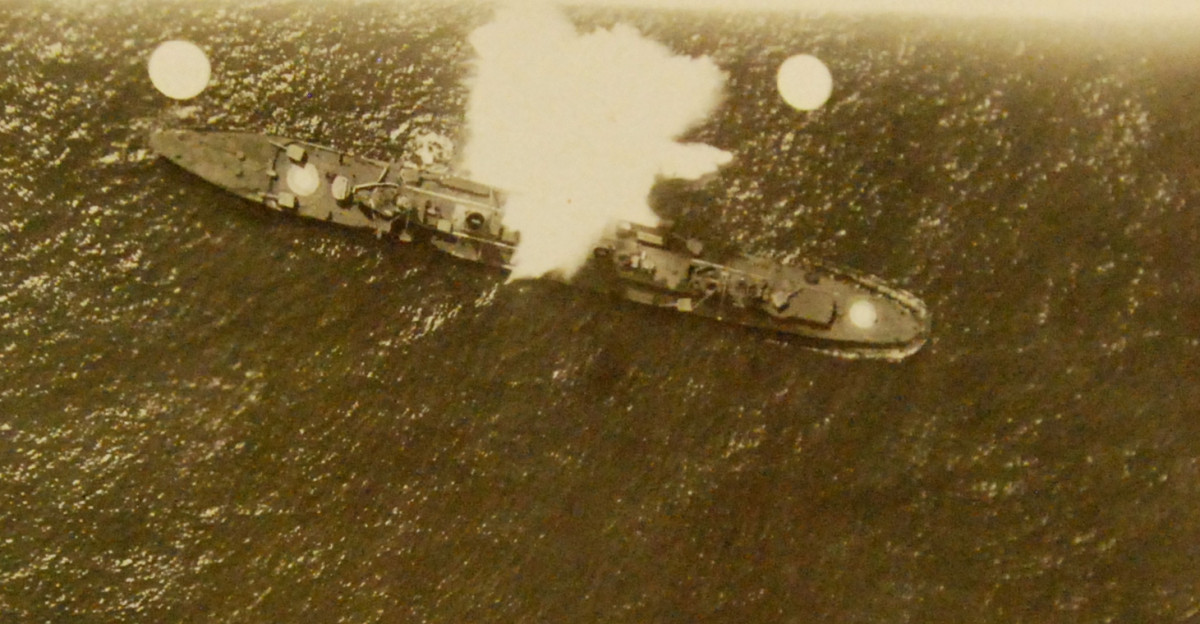 Lot 6079-4 Airship Roma album Airship Roma was purchased lighter-than-air aircraft purchased by the U S Army from the Italian government Album shows the Billy Mitchell aircraft bombing tests on German and U S Navy ships showing the vulnerability of ships to aerial bombing July 18 1921 The imagery is related to the bombing of the ex-German scout-cruiser Frankfurt This image shows an exploding bomb starboard mid-ship about 10 06 a m dropped by U S Navy F5L The circular holes to the left and right of the explosion are punched holes in the photograph Part of the William Mitchell papers transferred in 1953 8 21 2015