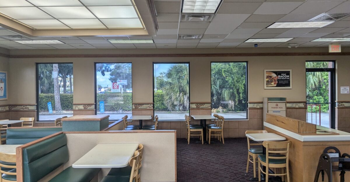 Intact interior of a closed Wendy s in Melbourne Florida