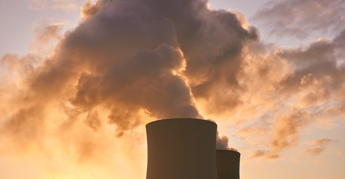 nuclear power plant cooling tower water vapor clouds heaven sunrise mood industry nuclear power energy power supply nature technology nuclear reactor power plant high voltage