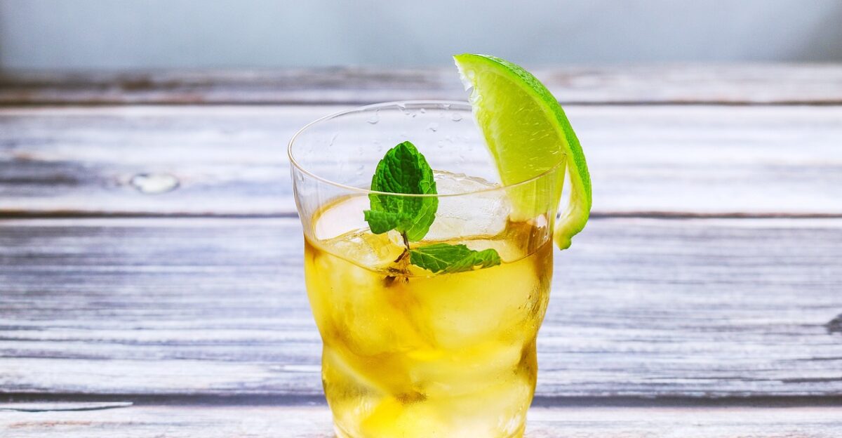 cocktail beverage lemon ice water glasses mint