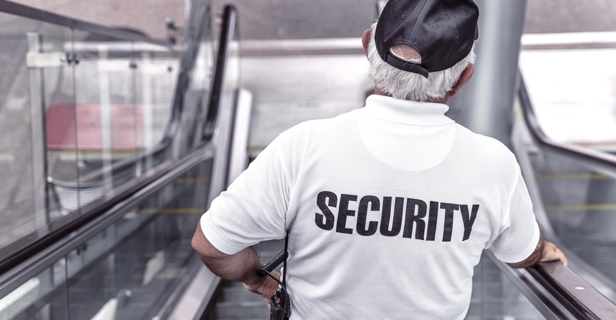 security, man, escalator, police, guard, officer, surveillance, control, monitoring, safety, uniform, back view, security, security, security, security, security, police, safety