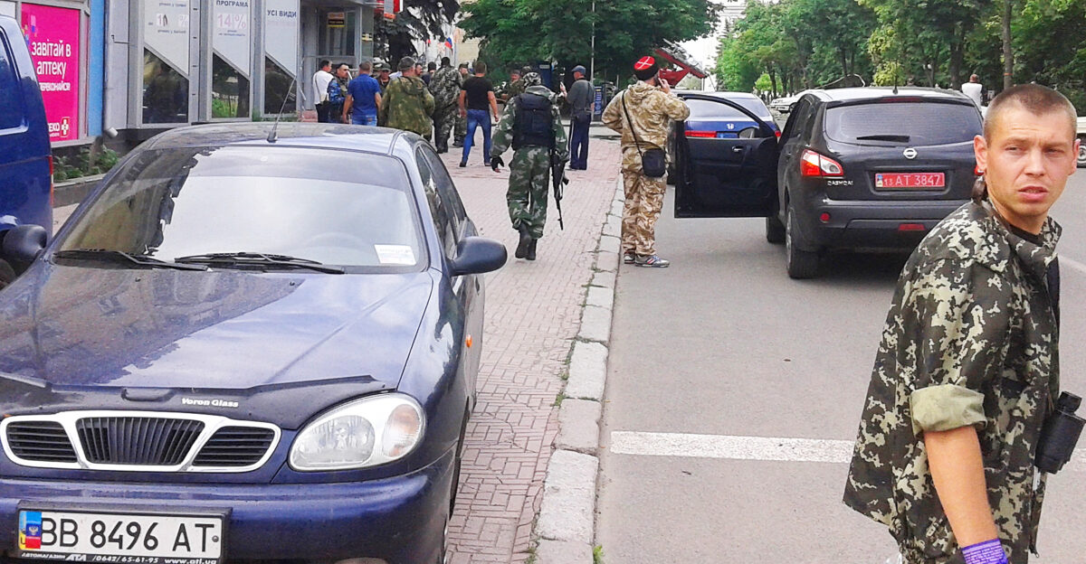 The militants of the organization Luhansk People s Republic Some of them came from outside Ukraine There is a Kuban Cossacks in the middle In the organization there are a lot of Muslims from the Caucasus But the majority identify themselves as the Orthodox believers On the separatist s wrist right there is a tape with a prayer Who lives under the shadow of the Almighty Psalm 91 Septuaginta Vulgata Psalm 90 At the license plates there is a flag of the LPR instead of Ukrainian flag