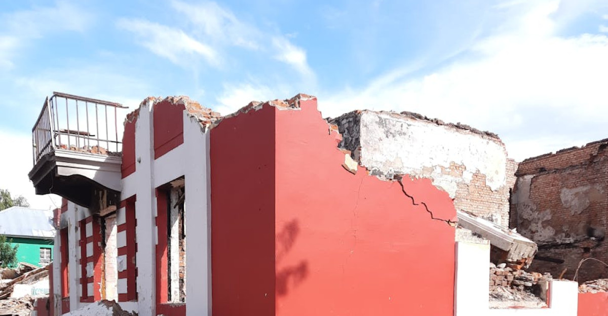 Debris and ruins of a demolished building in Kharkiv showcasing structural destruction