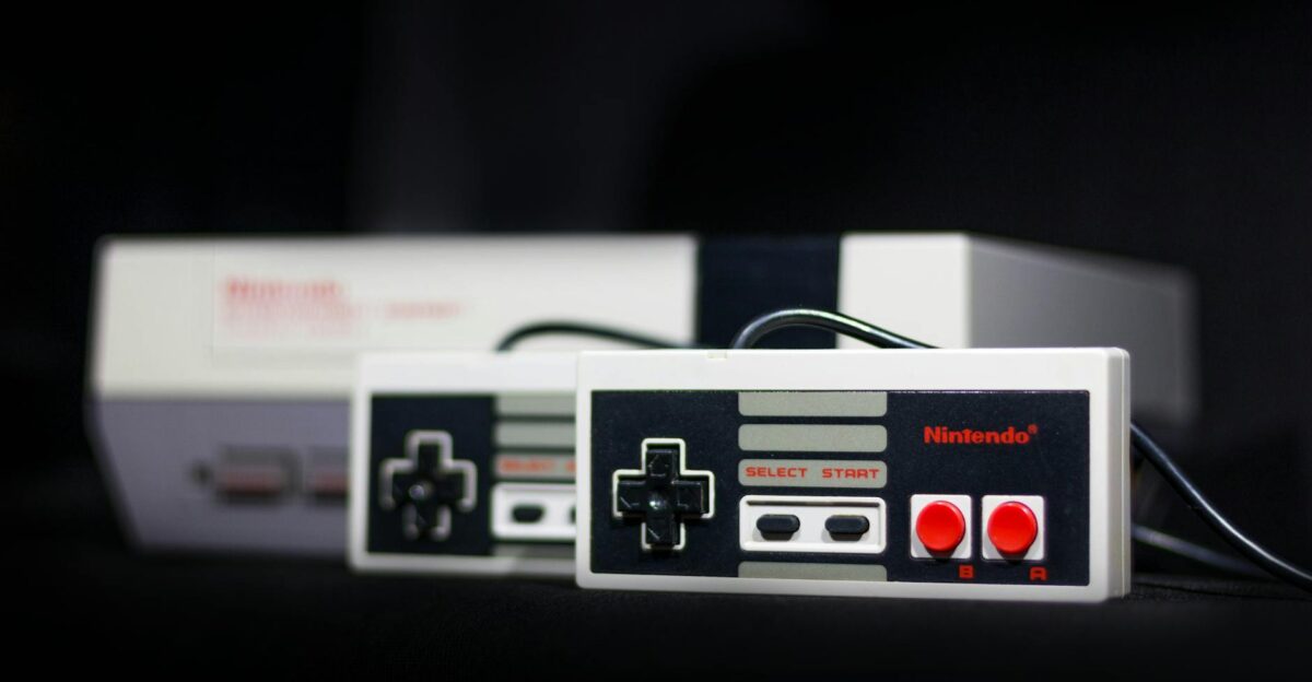 Close-up of a classic Nintendo console and controllers symbol of retro gaming