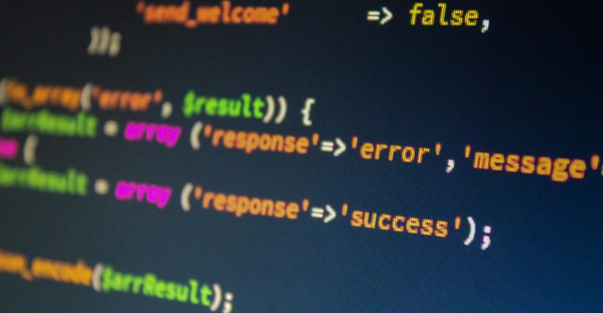 Close-up of PHP code on a monitor highlighting development and programming concepts