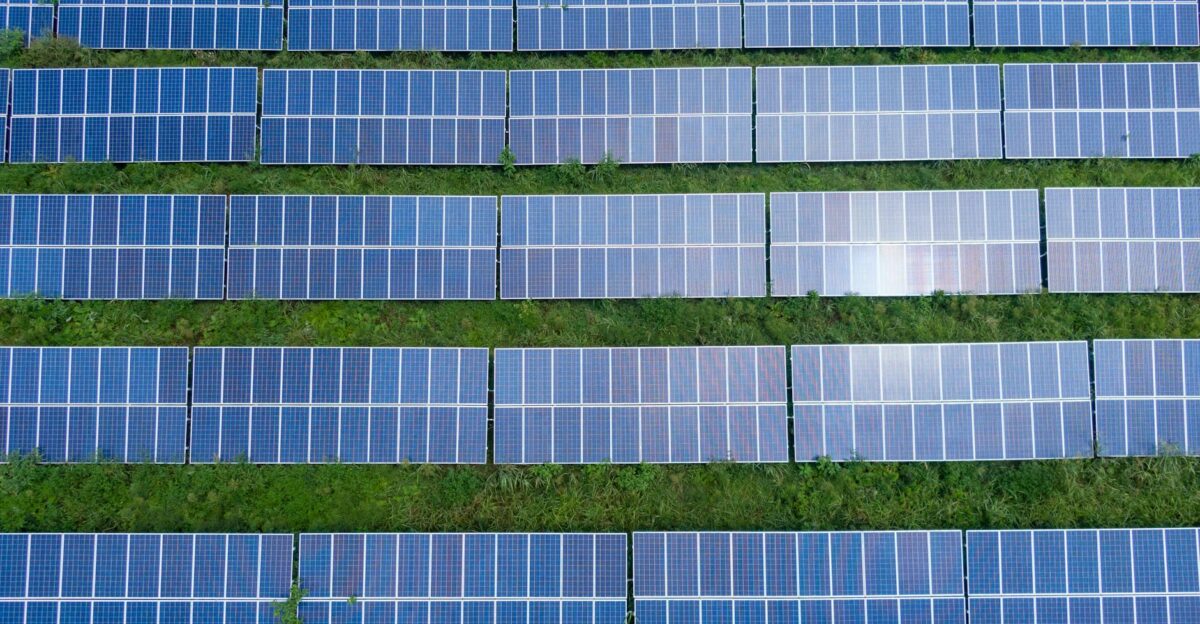 Aerial shot of a solar panel array generating renewable energy in Trenton Georgia