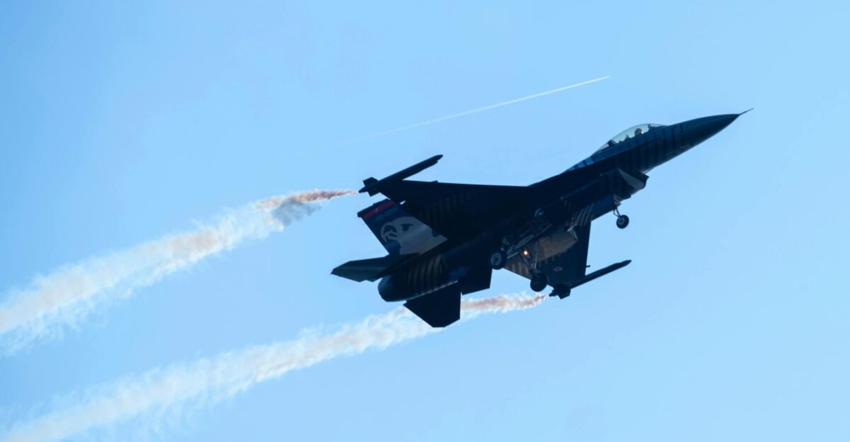 Dynamic shot of an F-16 fighter jet showcasing powerful flight capabilities