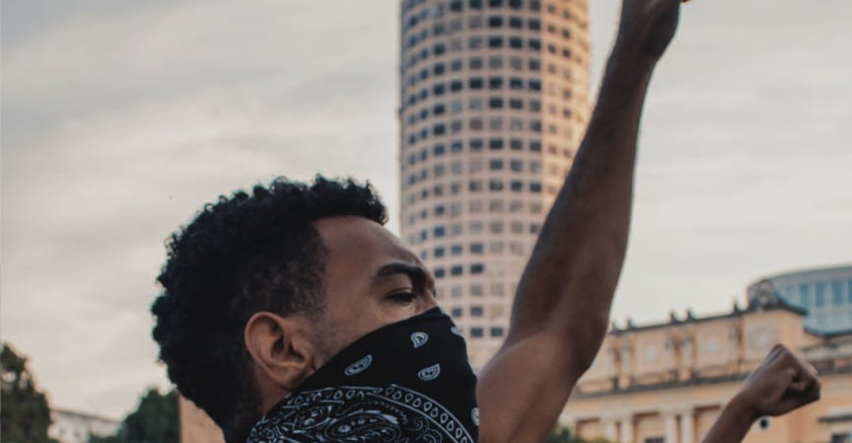A powerful demonstration in Rio de Janeiro with protesters passionately raising their fists in unity