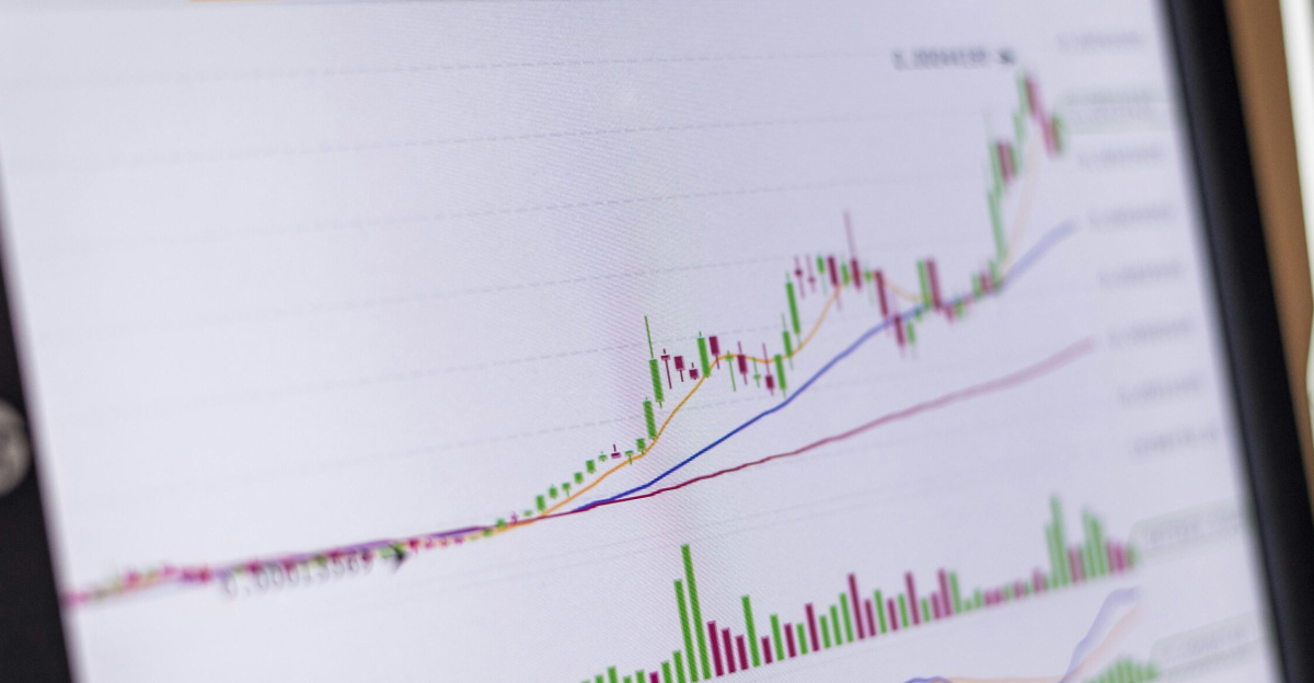 Close-up of a trading screen showing an increasing stock market chart.