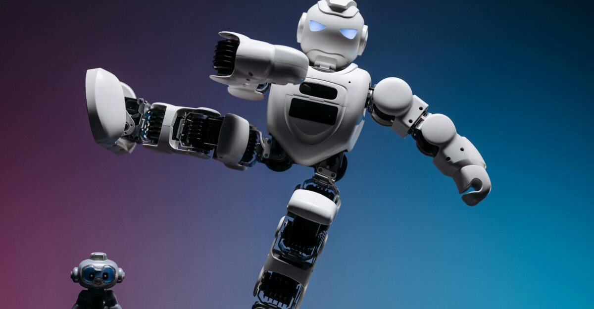 Close-up of two futuristic robots in a studio setting showcasing advanced robotics and innovation