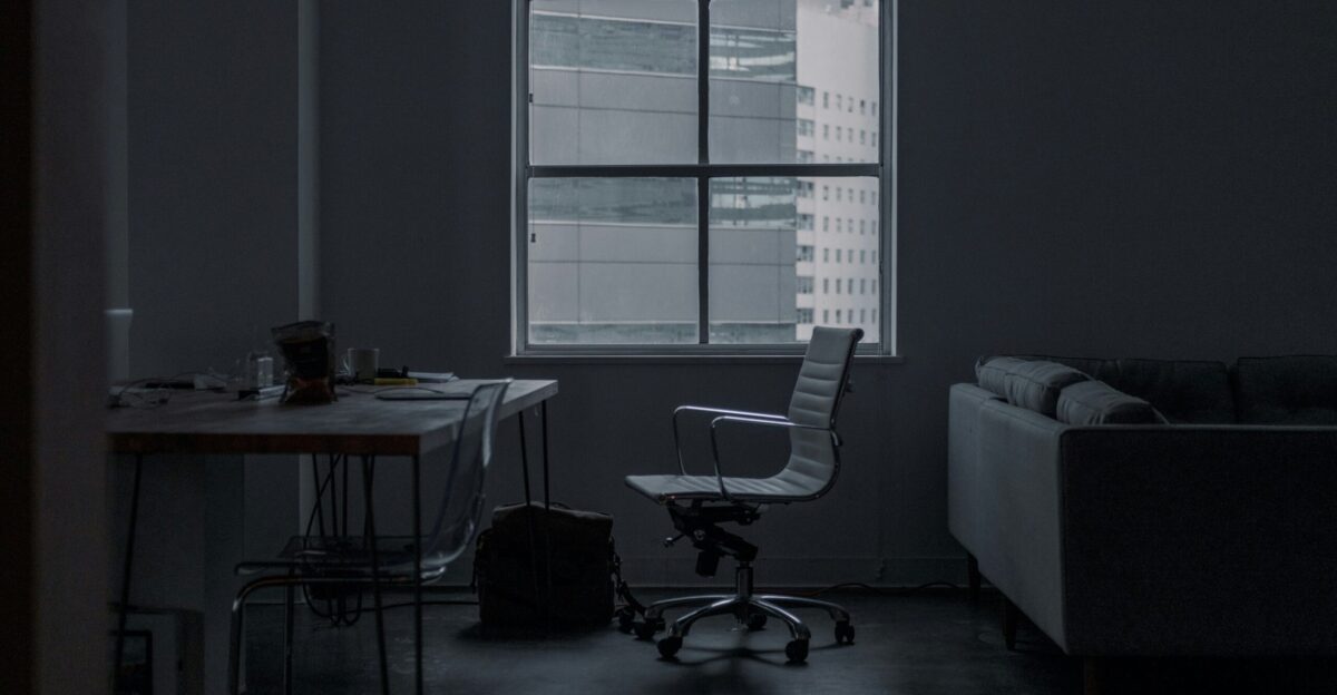 white rolling armchair in front of table