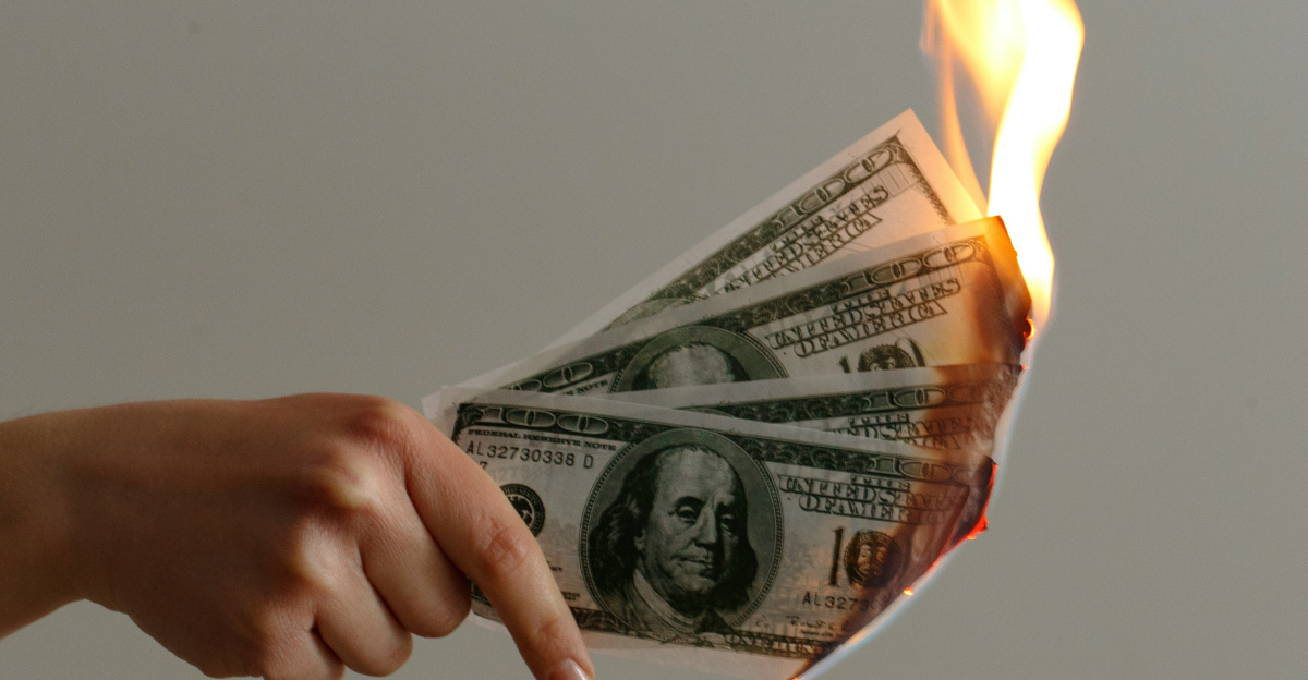 burned 100 US dollar banknotes