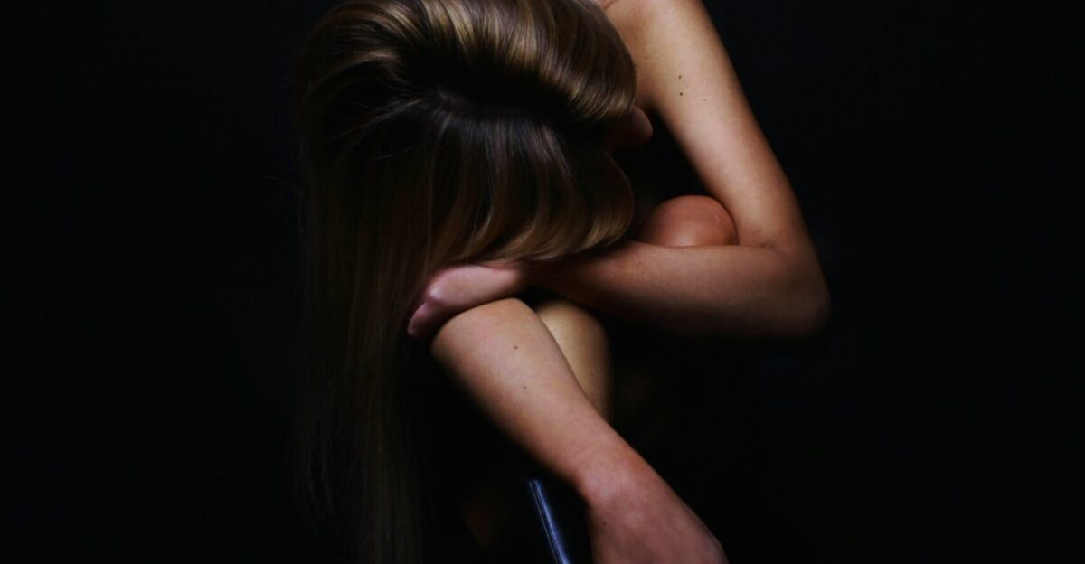 woman in black boots