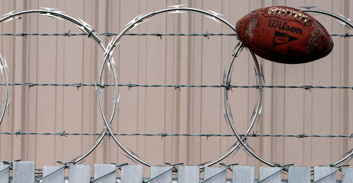 brown basketball on white metal fence