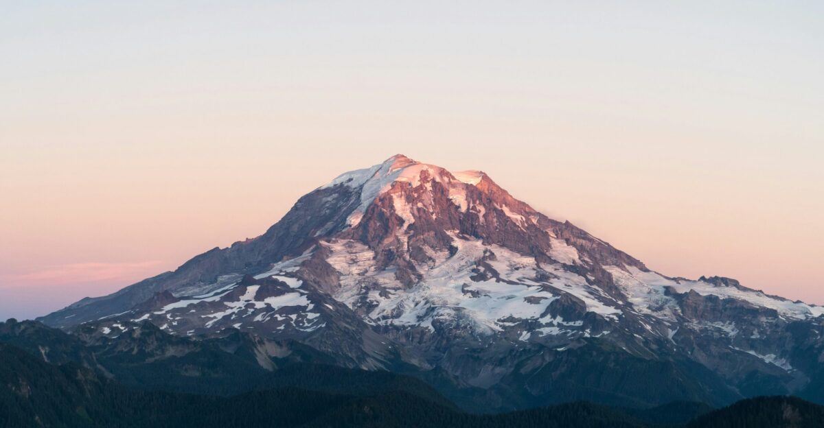 snow covered mountain during daytime