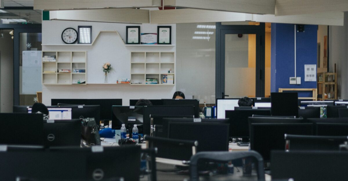 people sitting on chairs inside room