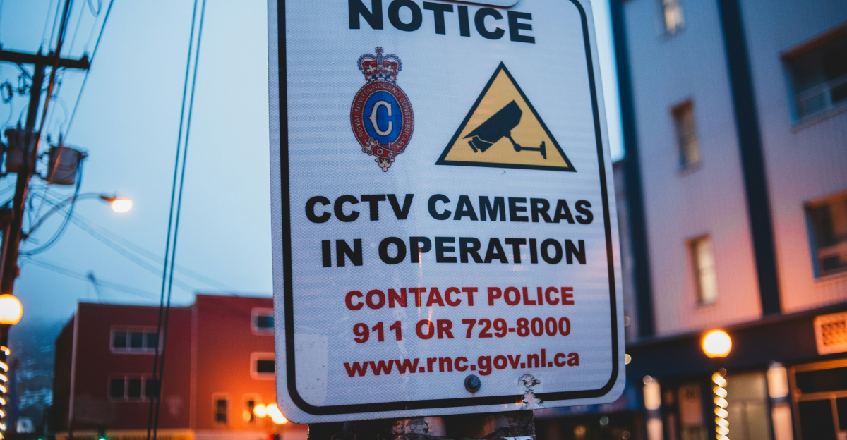 a street sign on a pole on a city street