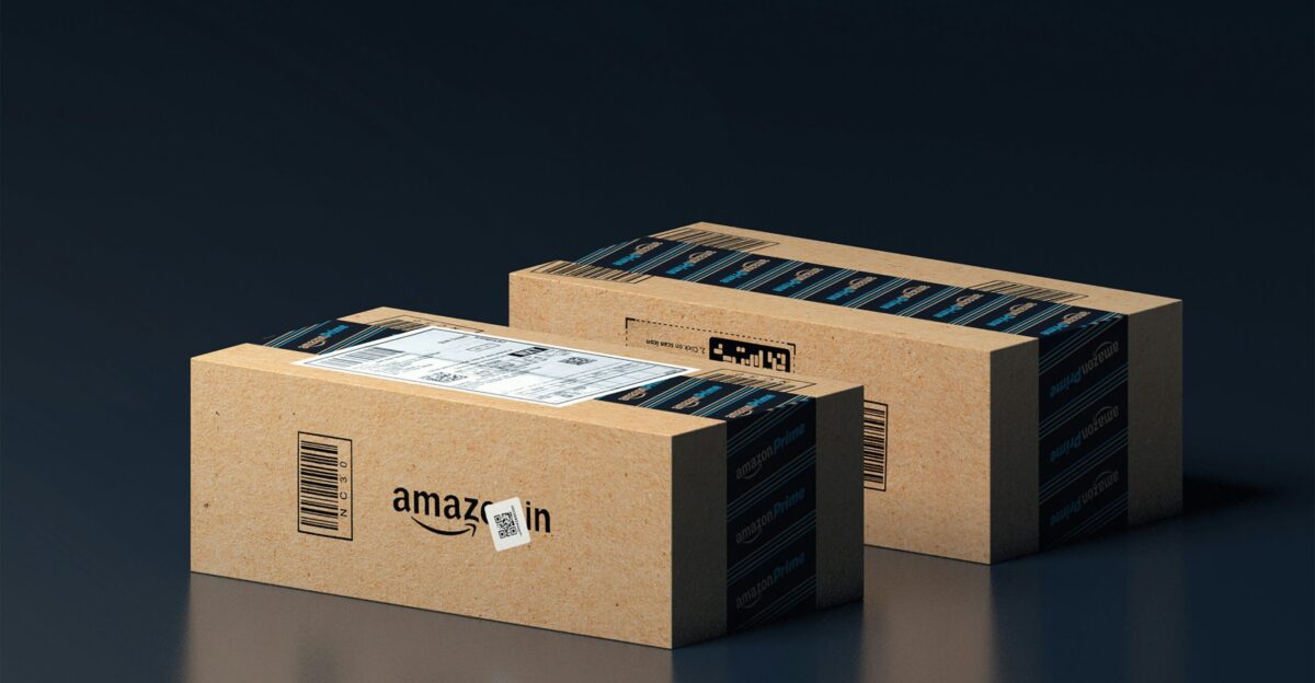 two boxes of amazon are stacked on top of each other