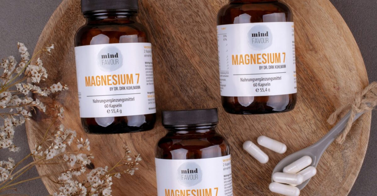 three bottles of magnesum on a wooden plate