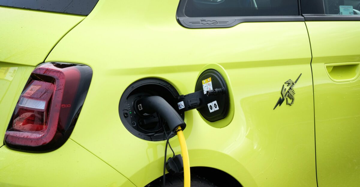 an electric car being charged by a charger