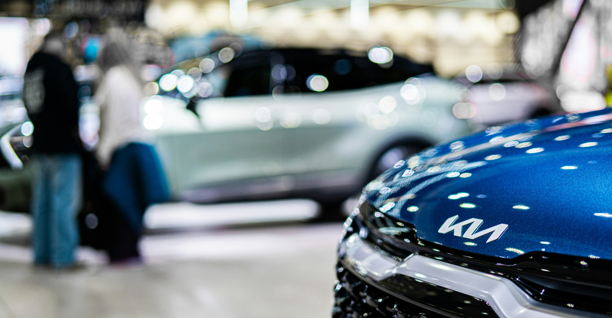 a close up of a car on display at a car show
