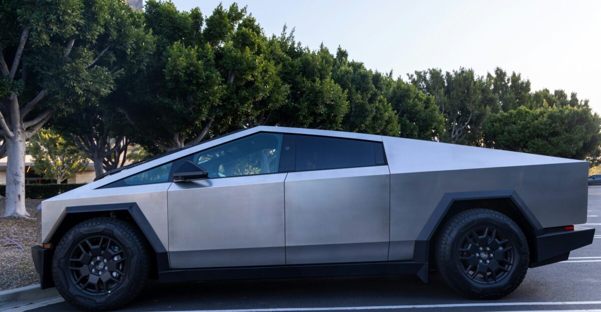 a futuristic car is parked in a parking lot