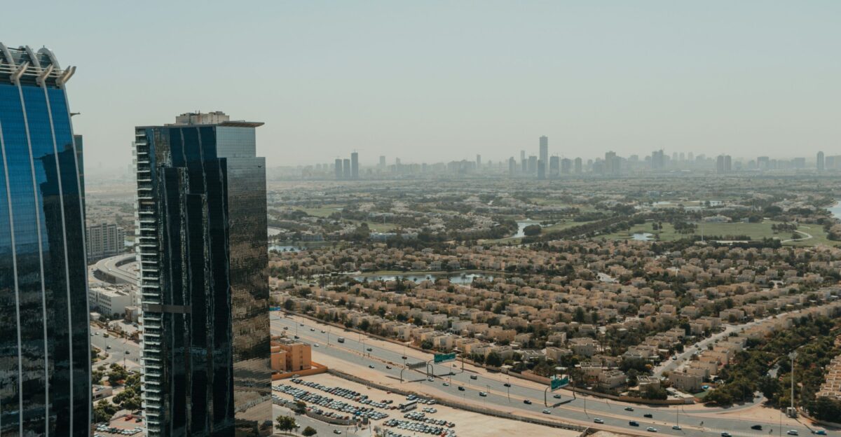 An aerial view of a city with tall buildings